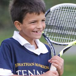 Young tennis player with a smile