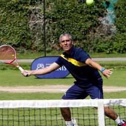 Tennis coach working on the volley drill